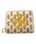 TORY BURCH（トリーバーチ）の古着「ラウンドジップウォレット」｜イエロー×ベージュ