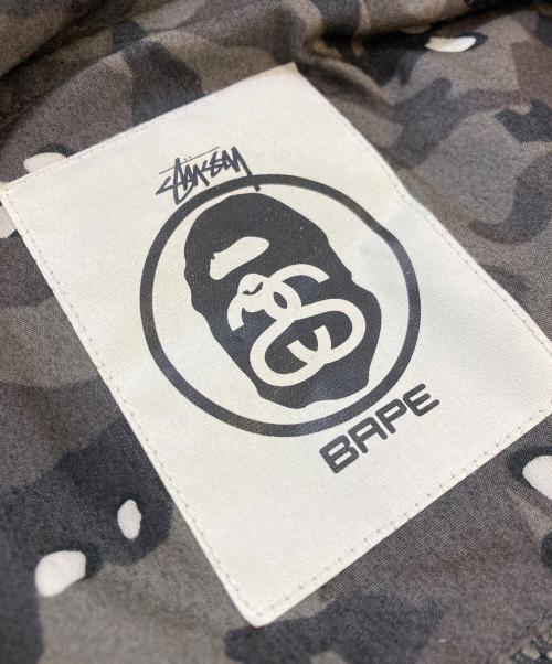 stussy（ステューシー）stussy (ステューシー) A BATHING APE (アベイシングエイプ) カモフラージュナイロンジャケット グレー サイズ:SIZE Mの古着・服飾アイテム