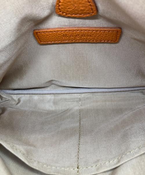 Magnu（マヌー）magnu (マヌー) ショルダーバッグ オレンジの古着・服飾アイテム