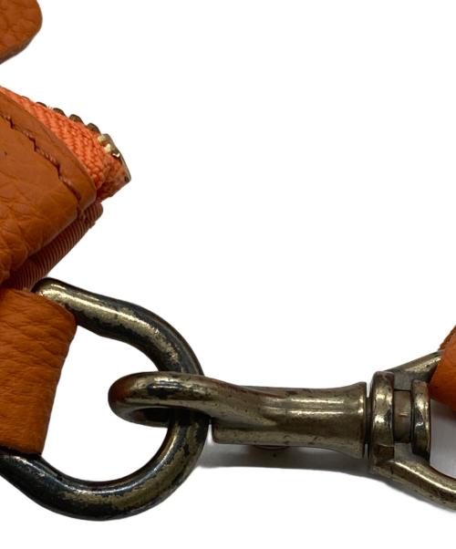 Magnu（マヌー）magnu (マヌー) ショルダーバッグ オレンジの古着・服飾アイテム