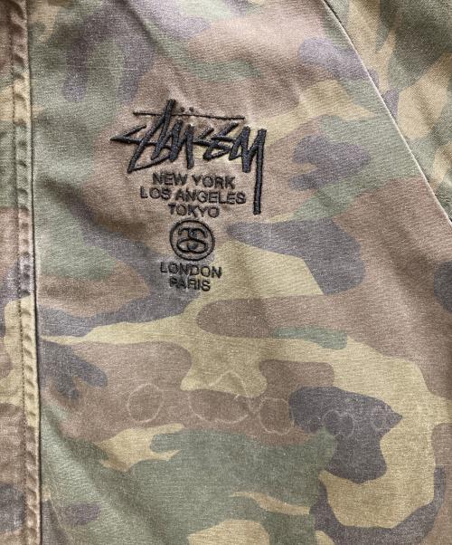 stussy（ステューシー）stussy (ステューシー) 00’s ウッドランドカモフーデッドジャケット グリーン サイズ:Mの古着・服飾アイテム