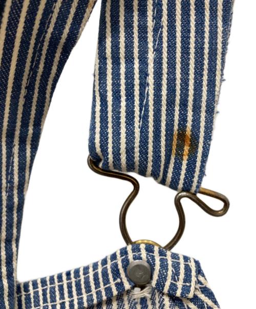 OSH KOSH（オシュコシュ）OSH KOSH (オシュコシュ) ヒッコリーデニムオーバーオール ブルー×ホワイト サイズ:freeの古着・服飾アイテム