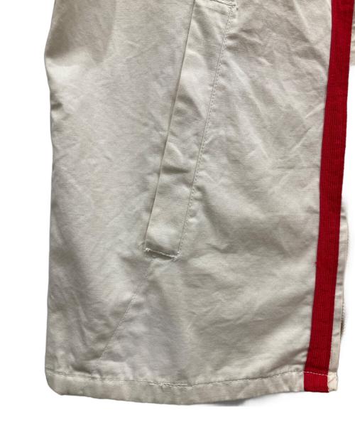 Champion（チャンピオン）Champion (チャンピオン) スイングトップ ベージュ×レッド サイズ:XLの古着・服飾アイテム