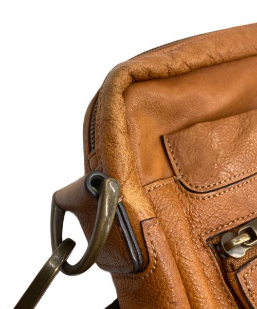 TUMI（トゥミ）TUMI (トゥミ) レザーショルダーバッグ ブラウンの古着・服飾アイテム