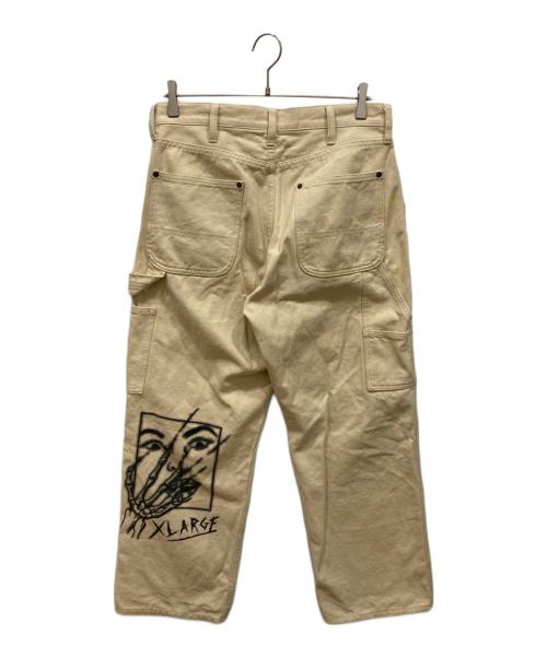 X-LARGE（エクストララージ）X-LARGE (エクストララージ) グラフィック ペインターパンツ ベージュ サイズ:W32の古着・服飾アイテム