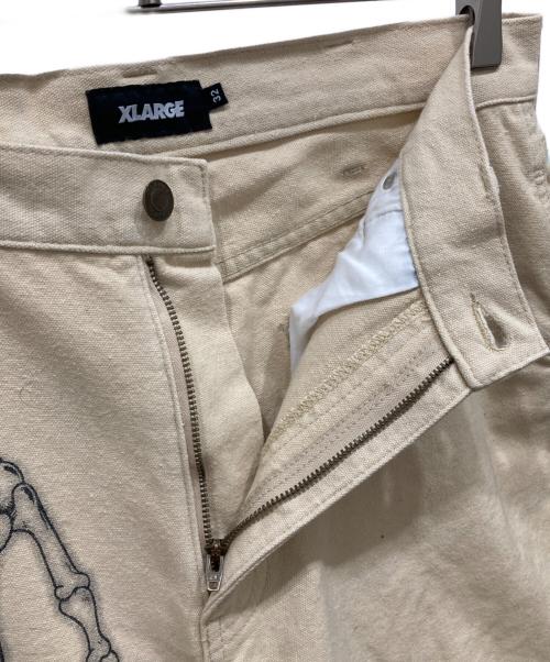 X-LARGE（エクストララージ）X-LARGE (エクストララージ) グラフィック ペインターパンツ ベージュ サイズ:W32の古着・服飾アイテム