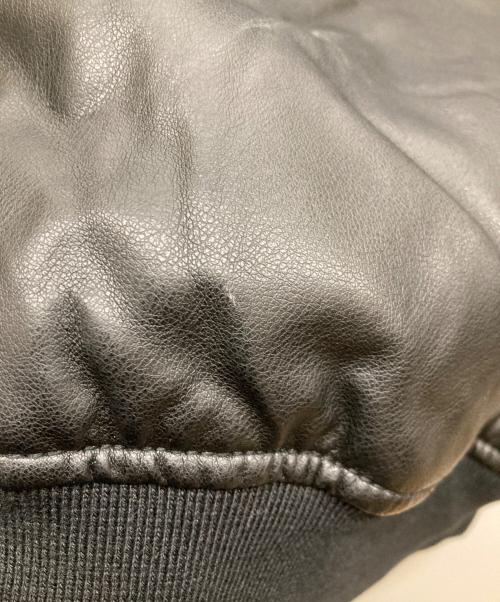 ALPHA INDUSTRIES（アルファインダストリーズ）ALPHA INDUSTRIES (アルファインダストリーズ) MA-1 フェイクレザージャケット ブラック×オレンジ サイズ:SIZE 02の古着・服飾アイテム