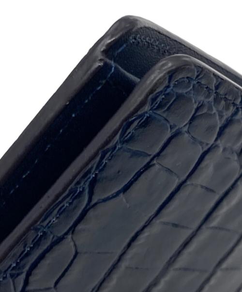 PAUL SMITH（ポールスミス）Paul Smith (ポールスミス) 型押し2つ折り財布 ブルーの古着・服飾アイテム