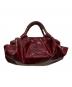 LOEWE（ロエベ）の古着「エナメルハンドバッグ」｜ワインレッド