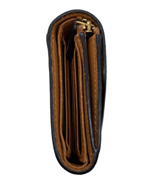 MCM（エムシーエム）MCM (エムシーエム) 3つ折り財布 ブラウン×ブラックの古着・服飾アイテム