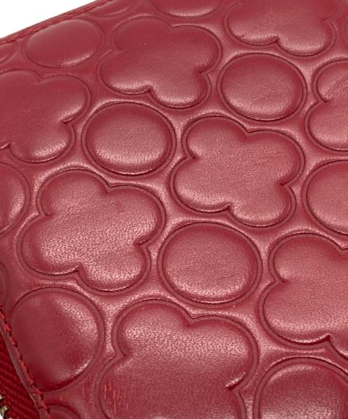 COMME des GARCONS（コムデギャルソン）COMME des GARCONS (コムデギャルソン) クローバー柄ラウンドジップウォレット レッドの古着・服飾アイテム