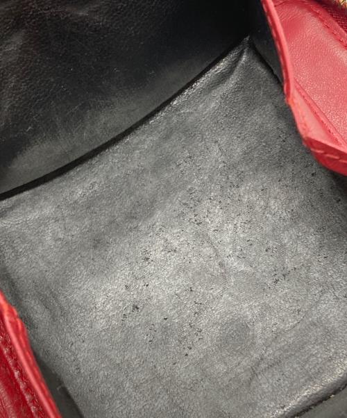 COMME des GARCONS（コムデギャルソン）COMME des GARCONS (コムデギャルソン) クローバー柄ラウンドジップウォレット レッドの古着・服飾アイテム