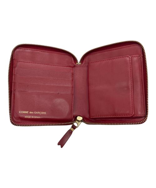 COMME des GARCONS（コムデギャルソン）COMME des GARCONS (コムデギャルソン) クローバー柄ラウンドジップウォレット レッドの古着・服飾アイテム