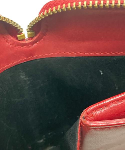 COMME des GARCONS（コムデギャルソン）COMME des GARCONS (コムデギャルソン) クローバー柄ラウンドジップウォレット レッドの古着・服飾アイテム