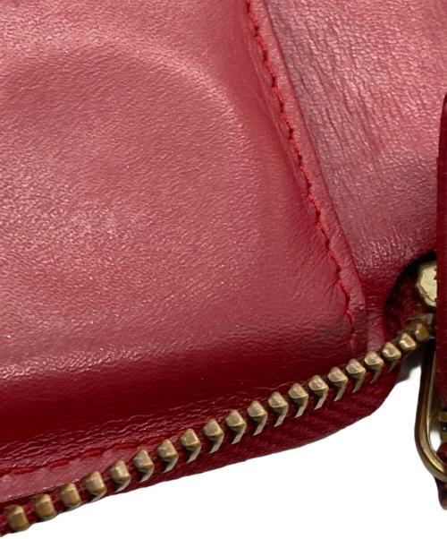 COMME des GARCONS（コムデギャルソン）COMME des GARCONS (コムデギャルソン) クローバー柄ラウンドジップウォレット レッドの古着・服飾アイテム