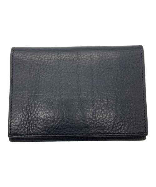 ISAMU KATAYAMA BACKLASH（イサムカタヤマ・バックラッシュ）ISAMU KATAYAMA BACKLASH (イサムカタヤマ・バックラッシュ) 2つ折り財布 ブラックの古着・服飾アイテム
