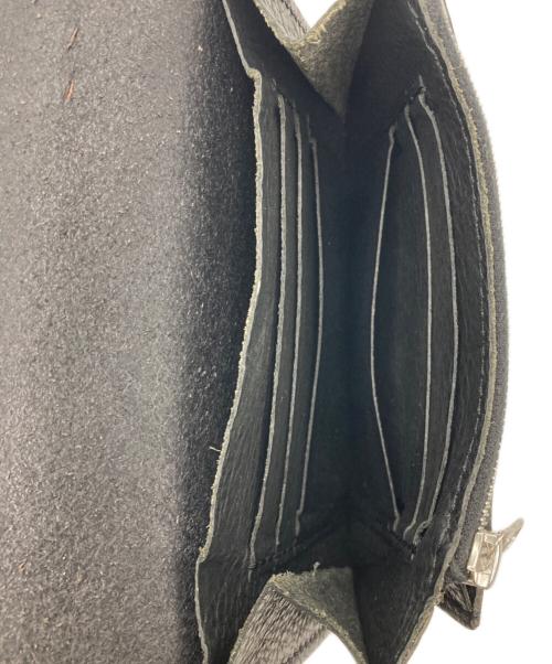 ISAMU KATAYAMA BACKLASH（イサムカタヤマ・バックラッシュ）ISAMU KATAYAMA BACKLASH (イサムカタヤマ・バックラッシュ) 2つ折り財布 ブラックの古着・服飾アイテム