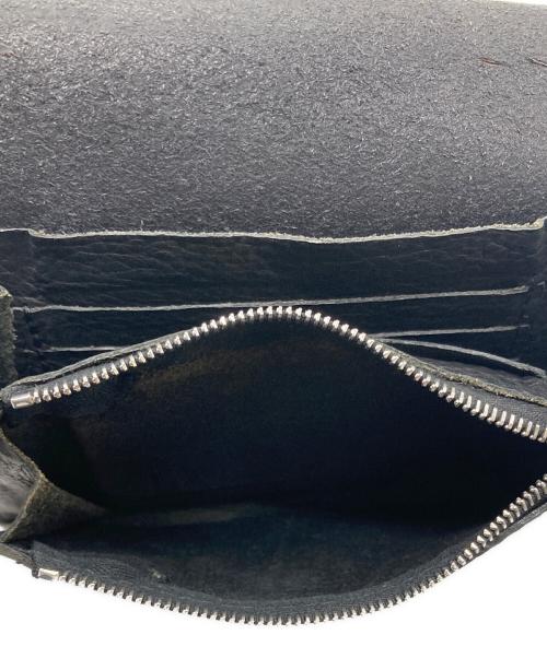 ISAMU KATAYAMA BACKLASH（イサムカタヤマ・バックラッシュ）ISAMU KATAYAMA BACKLASH (イサムカタヤマ・バックラッシュ) 2つ折り財布 ブラックの古着・服飾アイテム