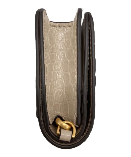 TORY BURCH（トリーバーチ）TORY BURCH (トリーバーチ) WALKER EMBOSSED NANO CHAIN WALLET ベージュの古着・服飾アイテム
