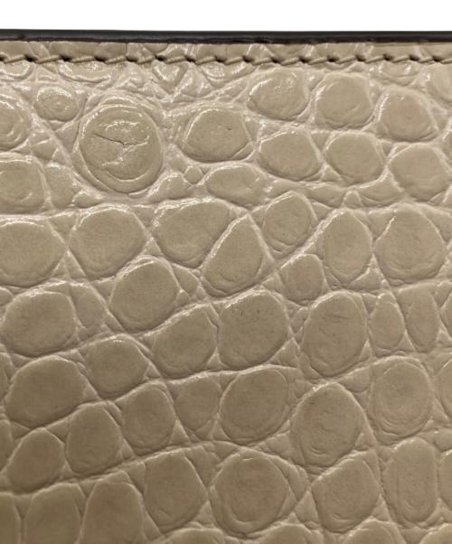 TORY BURCH（トリーバーチ）TORY BURCH (トリーバーチ) WALKER EMBOSSED NANO CHAIN WALLET ベージュの古着・服飾アイテム