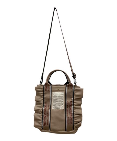 THEATRE PRODUCTS（シアタープロダクツ）THEATRE PRODUCTS (シアタープロダクツ) 2way フェイクレザー ジャガードテープ フリルバッグ ベージュの古着・服飾アイテム