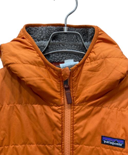Patagonia（パタゴニア）Patagonia (パタゴニア) キッズ・リバーシブル・レディ・フレディ・フーディ オレンジ サイズ:100cmの古着・服飾アイテム