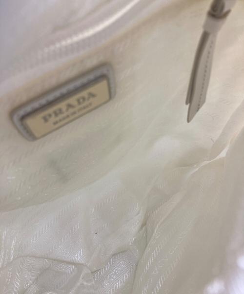 PRADA（プラダ）PRADA (プラダ) Re-Nylon xレザー バックパック ホワイトの古着・服飾アイテム