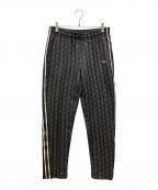 LACOSTEラコステ）の古着「サイドテーピングモノグラムジャカードトラックパンツ」｜ブラック