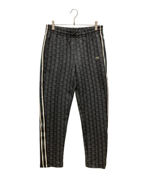 LACOSTE（ラコステ）LACOSTE (ラコステ) サイドテーピングモノグラムジャカードトラックパンツ ブラック サイズ:SIZE 5の古着・服飾アイテム