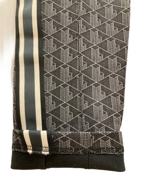 LACOSTE（ラコステ）LACOSTE (ラコステ) サイドテーピングモノグラムジャカードトラックパンツ ブラック サイズ:SIZE 5の古着・服飾アイテム