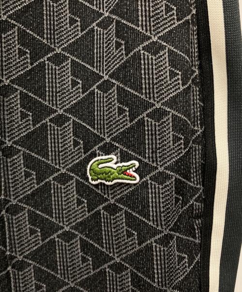 LACOSTE（ラコステ）LACOSTE (ラコステ) サイドテーピングモノグラムジャカードトラックパンツ ブラック サイズ:SIZE 5の古着・服飾アイテム