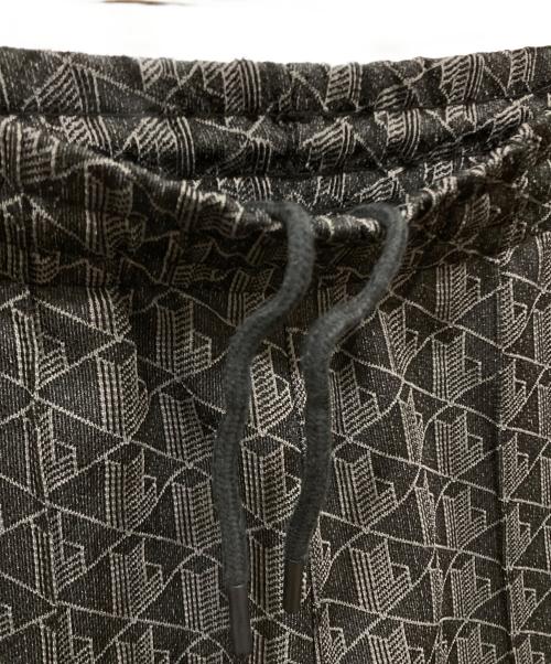 LACOSTE（ラコステ）LACOSTE (ラコステ) サイドテーピングモノグラムジャカードトラックパンツ ブラック サイズ:SIZE 5の古着・服飾アイテム