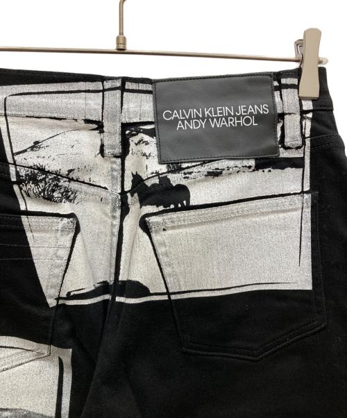 ANDY WARHOL（アンディウォーホル）ANDY WARHOL (アンディウォーホル) Calvin Klein Jeans (カルバンクラインジーンズ) アートプリントパンツ ブラック サイズ:SIZE 68.5cm (W27)の古着・服飾アイテム