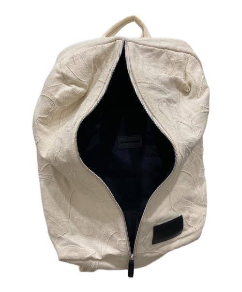 EMPORIO ARMANI（エンポリオ アルマーニ）EMPORIO ARMANI (エンポリオ アルマーニ) トライバルバックパック アイボリーの古着・服飾アイテム