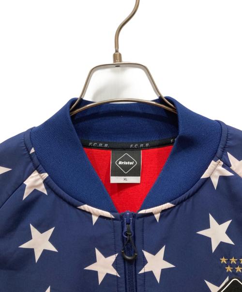 F.C.R.B.（エフシーレアルブリストル）F.C.R.B. (エフシーレアルブリストル) COCA-COLA PDK JACKET ネイビー サイズ:XLの古着・服飾アイテム