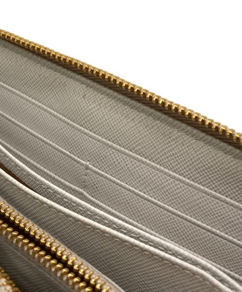 PRADA（プラダ）PRADA (プラダ) サフィアーノレザーウォレット アイボリーの古着・服飾アイテム