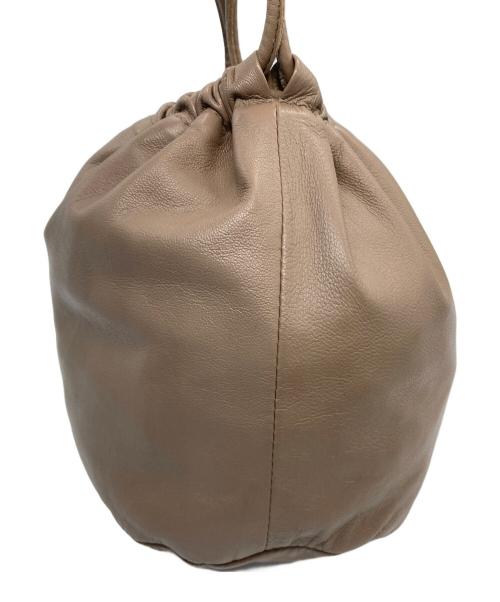 Ayakawasaki（アヤカワサキ）Ayakawasaki (アヤカワサキ) drawstring bag ベージュの古着・服飾アイテム