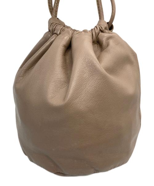 Ayakawasaki（アヤカワサキ）Ayakawasaki (アヤカワサキ) drawstring bag ベージュの古着・服飾アイテム