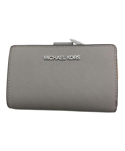 MICHAEL KORS（マイケル・コース）MICHAEL KORS (マイケル・コース) ビルフォールド ジップ コンパクトウォレット ミディアム グレーの古着・服飾アイテム