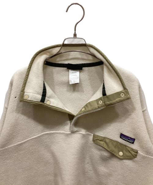 Patagonia SYNCHILLA（パタゴニア シンチラ）Patagonia SYNCHILLA (パタゴニア シンチラ) シンチラスナップT アイボリー サイズ:SIZE Mの古着・服飾アイテム