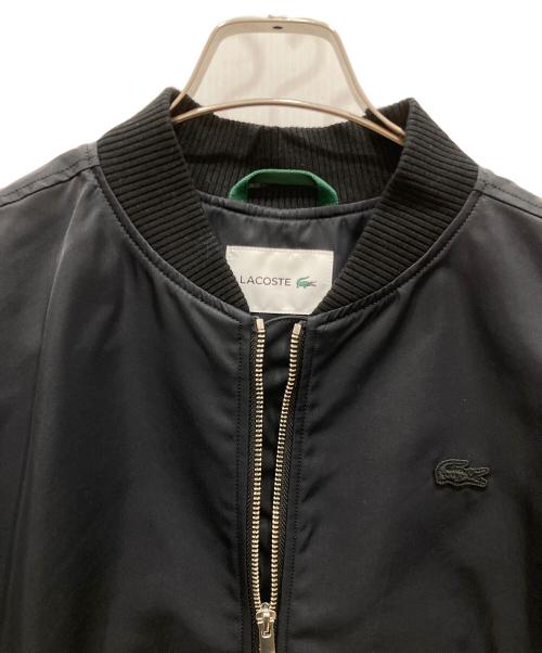LACOSTE（ラコステ）LACOSTE (ラコステ) デタッチャブルスリーブボンバージャケット ネイビー サイズ:SIZE 38の古着・服飾アイテム