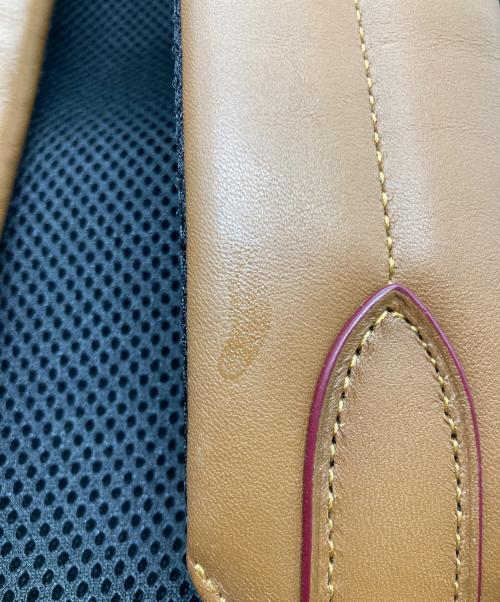 COACH（コーチ）COACH (コーチ) Disney (ディズニー) コラボバックパック ブラウンの古着・服飾アイテム