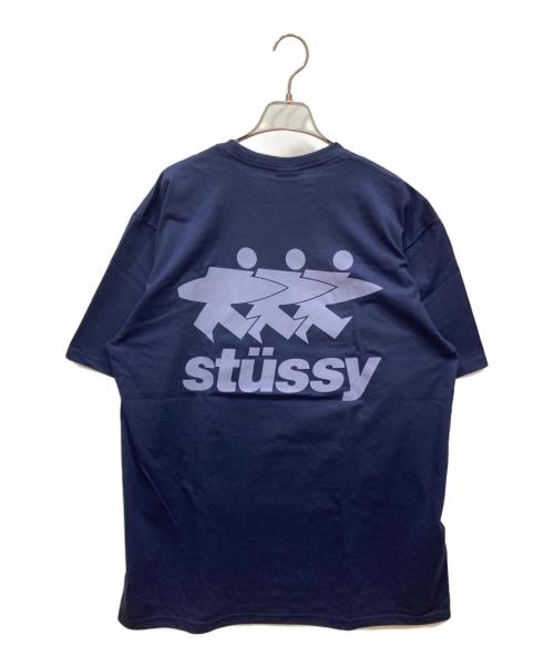 stussy（ステューシー）stussy (ステューシー) サーフマン プリントTシャツ ネイビー サイズ:SIZE Lの古着・服飾アイテム