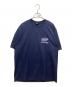 stussy（ステューシー）の古着「サーフマン プリントTシャツ」｜ネイビー