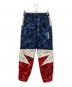 A BATHING APE（アベイシングエイプ）の古着「COLOR CAMO BAPESTA TRACK PANTS」｜ネイビー