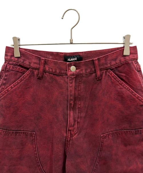 X-LARGE（エクストララージ）X-LARGE (エクストララージ) OVERDYED WORK PANTS レッド サイズ:SIZE 81cm (W32)の古着・服飾アイテム
