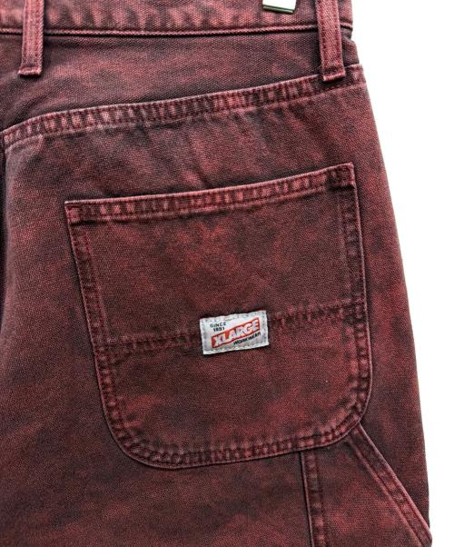 X-LARGE（エクストララージ）X-LARGE (エクストララージ) OVERDYED WORK PANTS レッド サイズ:SIZE 81cm (W32)の古着・服飾アイテム