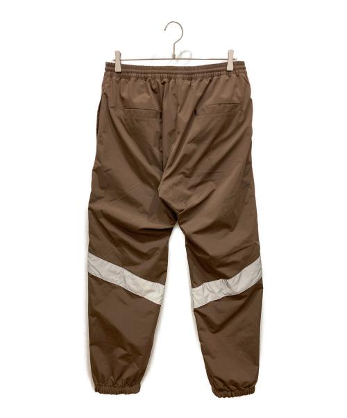 LFYT（エルエフワイティー）LFYT (エルエフワイティー) REFLECTOR TRACK PANTS ブラウン サイズ:SIZE Lの古着・服飾アイテム