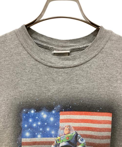 Disney STORE（ディズニーストア）Disney STORE (ディズニーストア) 00’SプリントTシャツ グレー サイズ:SIZE Mの古着・服飾アイテム