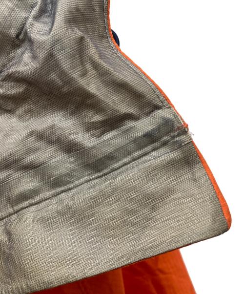 mont-bell（モンベル）mont-bell (モンベル) ストームクルーザー ジャケット Men's オレンジ×ブルー サイズ:SIZE XLの古着・服飾アイテム